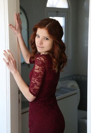 18 year old girl Agnes uncovers her perky tits as she gets completely naked